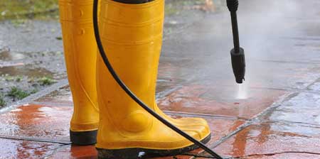 Power wash cleaning in Walnut Creek by Easylife Solution removing grime from driveway