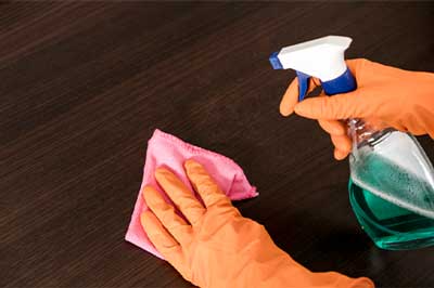 Professional cleaner at Easy Life Home Solutions delivering detailed floor care services in Walnut Creek