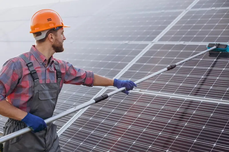Easy Life Cleaning technician washing commercial solar panels in Walnut Creek