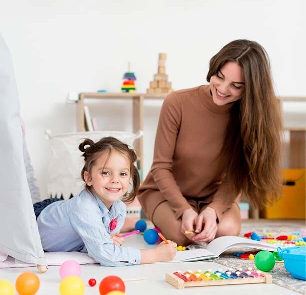 Easy Life Solution babysitter services in Walnut Creek helping a girl to draw