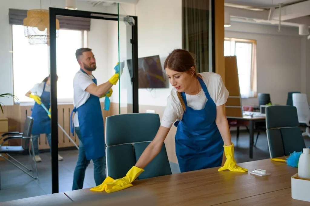 Easy Life Solution Janitorial Services team cleaning office desks and glass doors in Walnut Creek CA