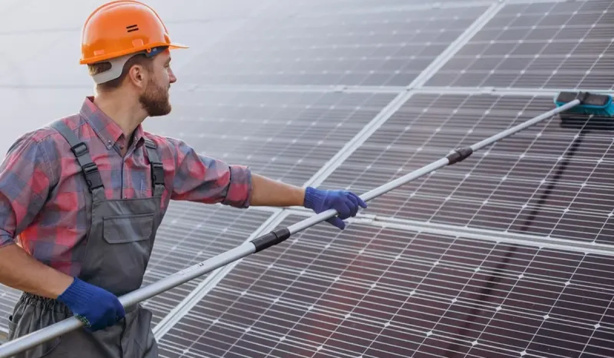 Easy Life Cleaning technician washing commercial solar panels in Walnut Creek