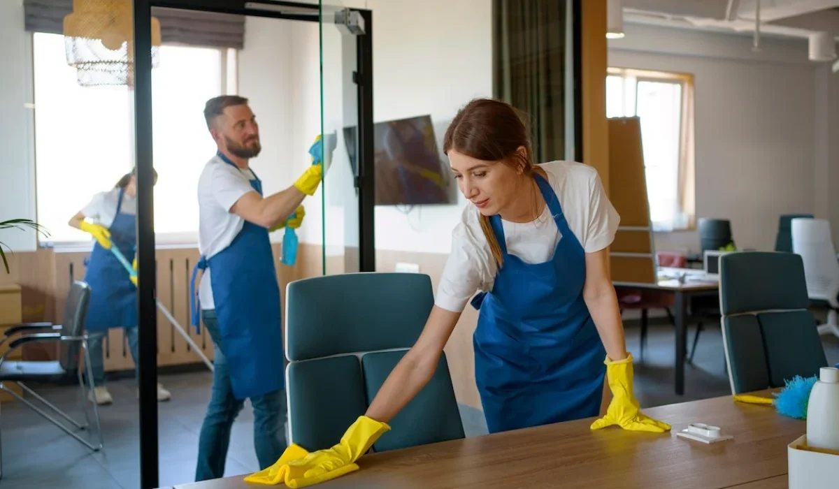 Easy Life Solution Janitorial Services team cleaning office desks and glass doors in Walnut Creek CA